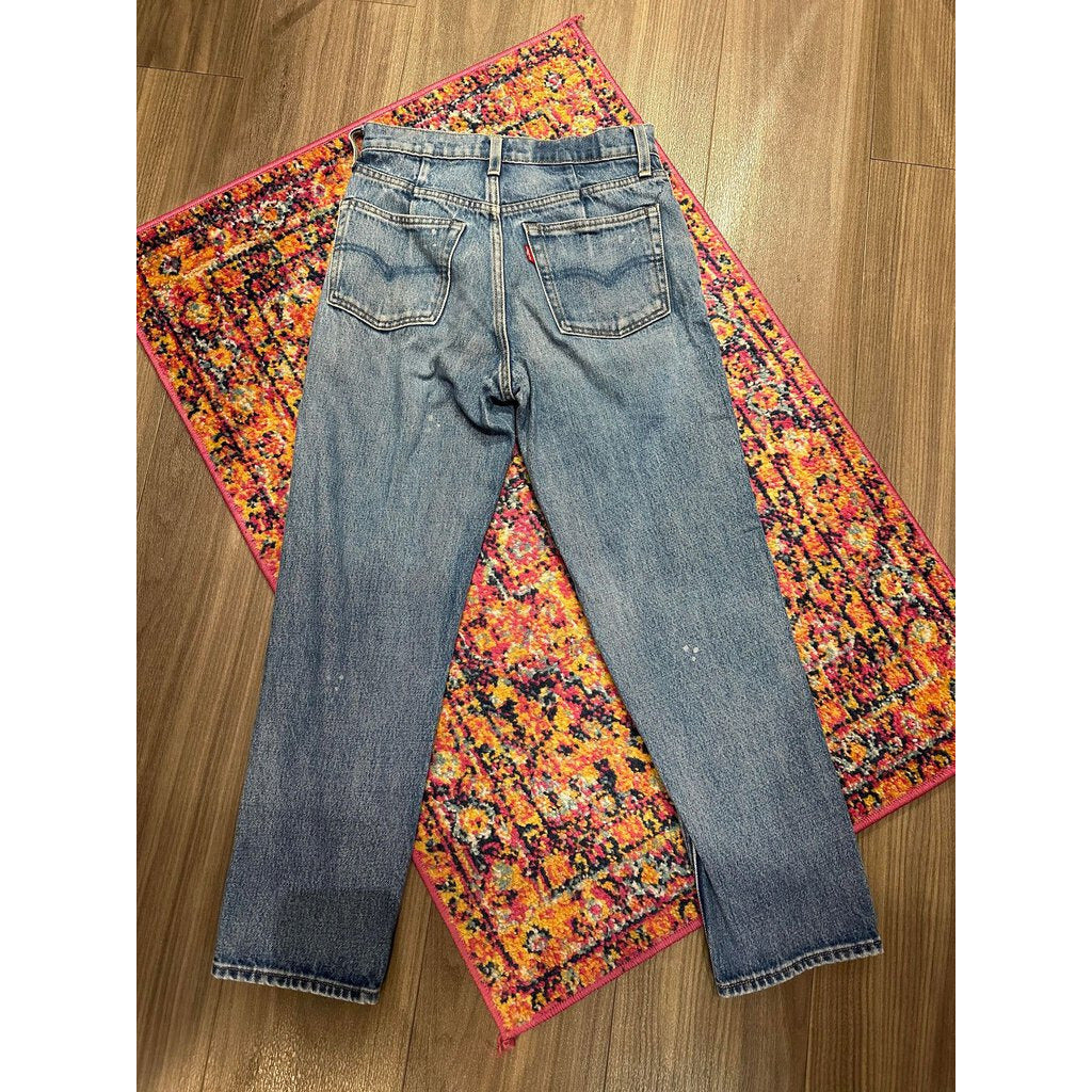 American Vintage Re-Imagined Size 25 Levi’s with distressing and 2024 checked trim.